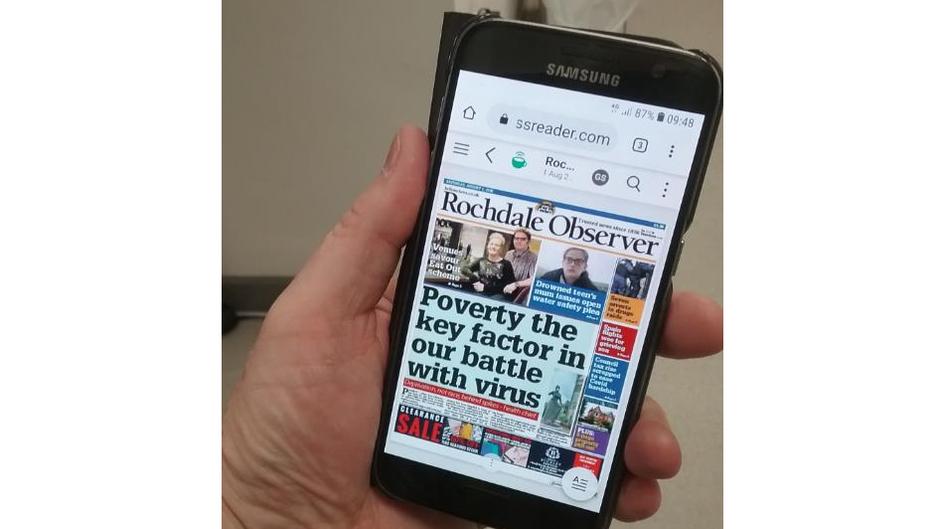 newspaper smartphone