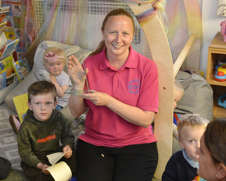 kate locker apprentice of the year for early years and care with pupils from flamborough pre school