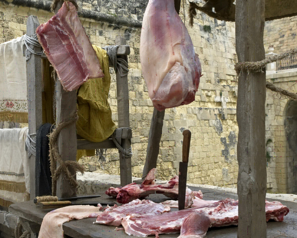 a medieval butchers market stall